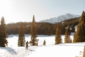 person skiing in the mountains